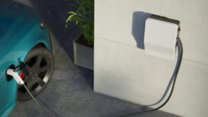 Türkises E-Auto wird mit einer Wallbox aufgeladen